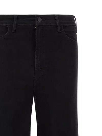 Mother The Roller Sneak Flared Jeans In Black
