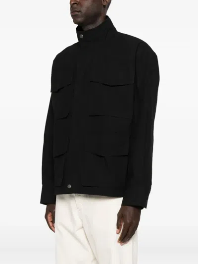 Studio Nicholson Elasticated-waist Multi-pocket Jacket In Black