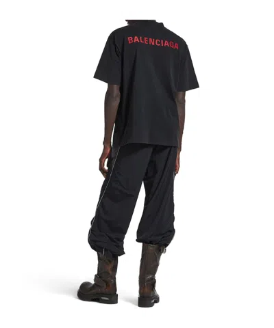 Balenciaga Black Crewneck T-shirt With Logo On The Front And On The Back In Cotton Man In Black