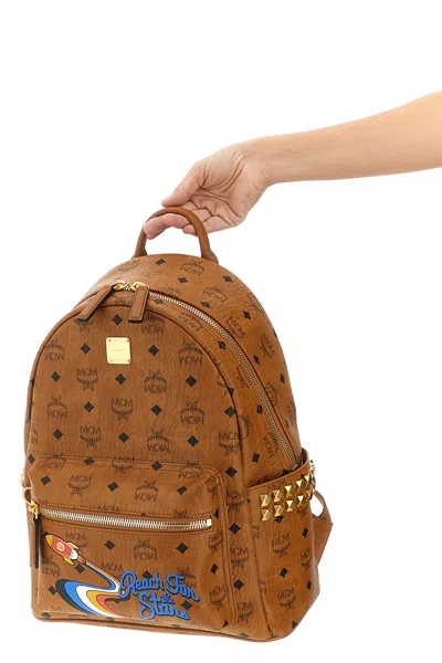 Mcm Small Medium Backpack With Front Pocket And Straps In Brown