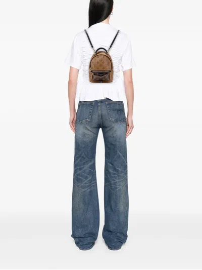 Pre-owned Louis Vuitton 2017 Monogram Reverse Mini Palm Springs Backpack In Brown