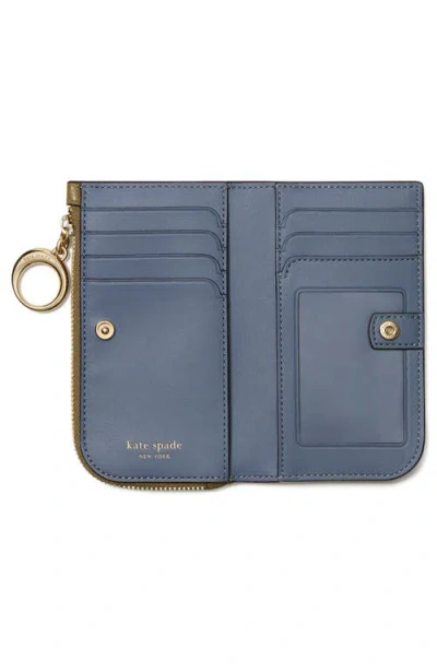 Kate Spade Halo Glazed Small Bifold Wallet In Gold