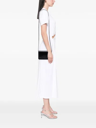 Pre-owned Chanel 2013-2014 Cc Embossed Lambskin Wallet On Chain Crossbody Bag In Black