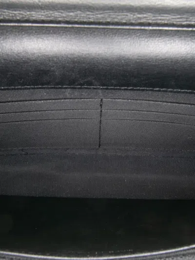 Pre-owned Chanel 2013-2014 Cc Embossed Lambskin Wallet On Chain Crossbody Bag In Black