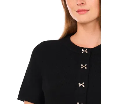 Cece Short Sleeve Bow Button Cardigan In Black