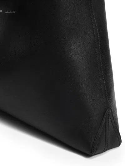 Ami Alexandre Mattiussi Etienne Leather Trapezoid Shoulder Bag In Black
