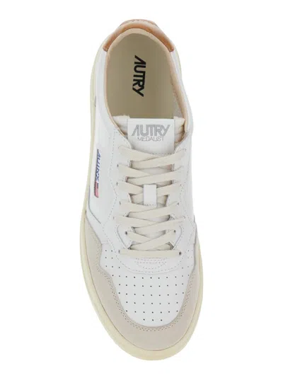 Autry Low-top Sneakers With Suede Inserts And Contrasting Heel In White