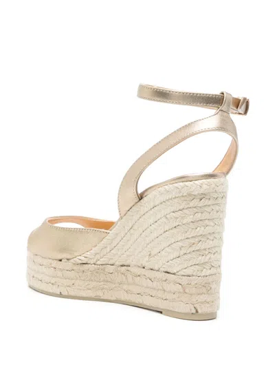 Castaã±er Round-toe Wedge Sandals In Gold