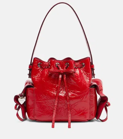 Acne Studios Multipocket Mini Bucket Bag Crinkled Patent In Red