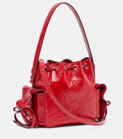 Acne Studios Multipocket Mini Bucket Bag Crinkled Patent In Red