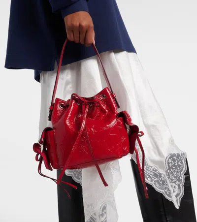 Acne Studios Multipocket Mini Bucket Bag Crinkled Patent In Red