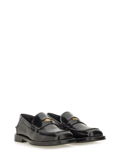 Moschino Brushed Calfskin Loafers In Black