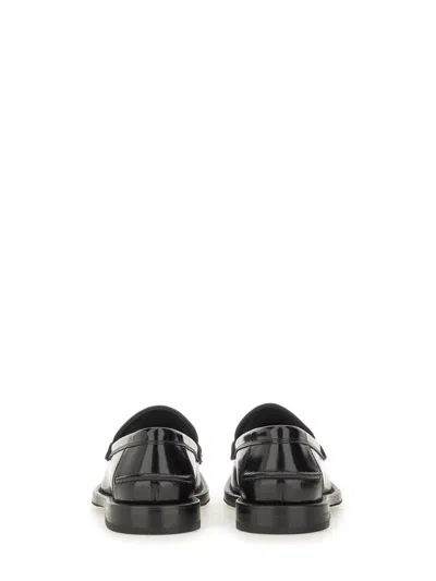Moschino Brushed Calfskin Loafers In Black