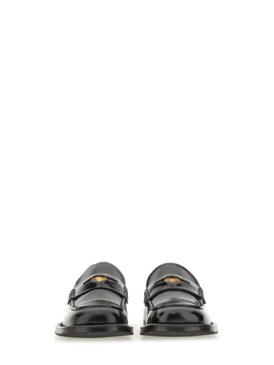 Moschino Brushed Calfskin Loafers In Black