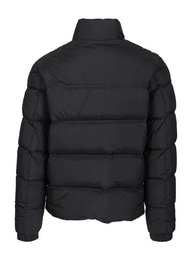 Moncler Puffer Jacket With High Collar And Quilted Design In Black