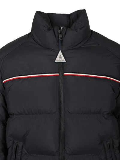 Moncler Puffer Jacket With High Collar And Quilted Design In Black