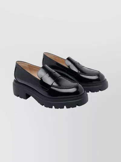 Stuart Weitzman Round Toe Chunky Sole Glossy Loafers In Black