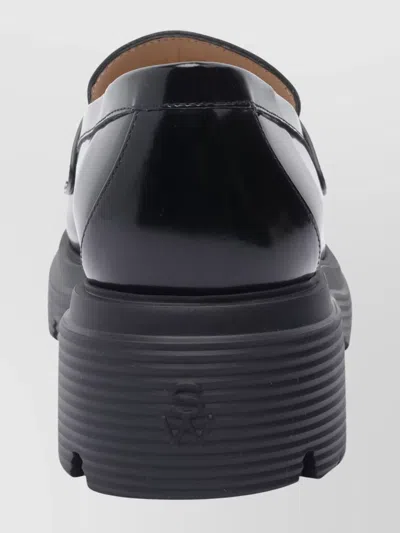 Stuart Weitzman Round Toe Chunky Sole Glossy Loafers In Black