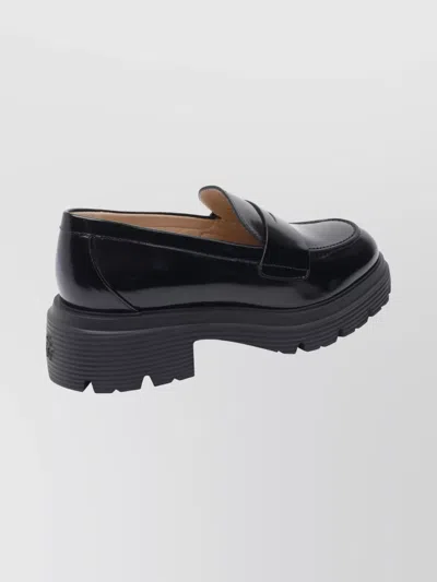 Stuart Weitzman Round Toe Chunky Sole Glossy Loafers In Black