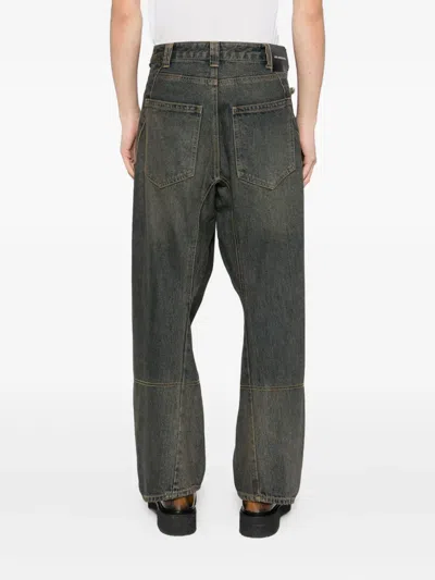 旋褶拉链口袋牛仔裤