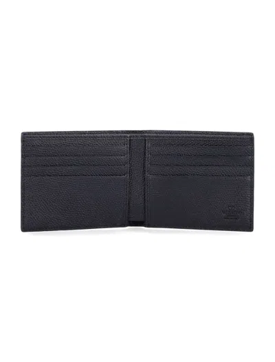 Valentino Garavani Textured Leather Wallet With Subtle Logo Detail In Black