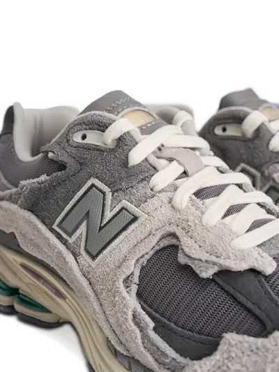 New Balance Layered Mesh And Suede Sneakers With Retro Aesthetic In Gray