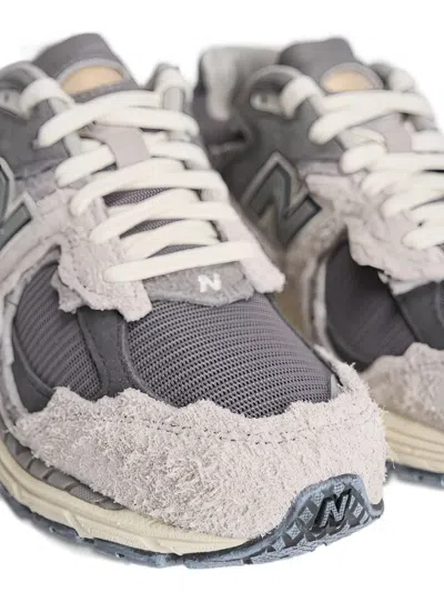 New Balance Layered Mesh And Suede Sneakers With Retro Aesthetic In Gray