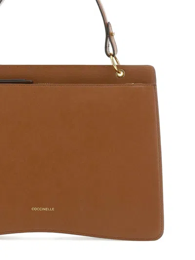 Coccinelle Structured Brown Leather Top Handle Handbag In Brown