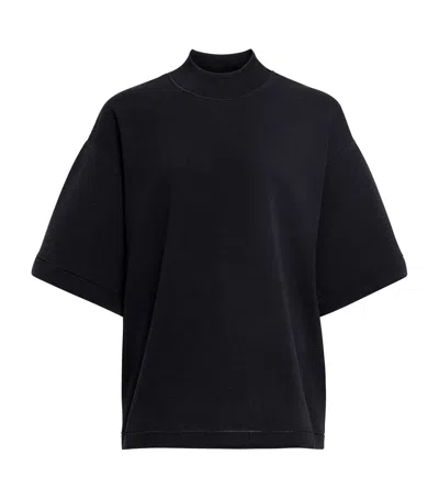 Alaïa High Neck Ribbed Cotton T-shirt In Black