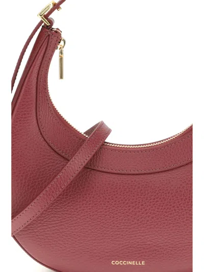 Coccinelle Whisper Crescent Top-handle Shoulder Bag In Red