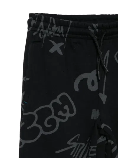 Msgm Graffiti-print Track Pants In Black