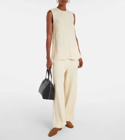 Totême Leather Handbag With Engraved Logo On The Front In Black