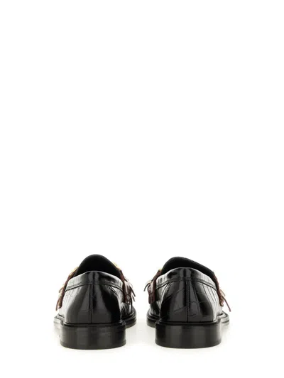 Moschino Textured Round Toe Loafers Fringe In Black
