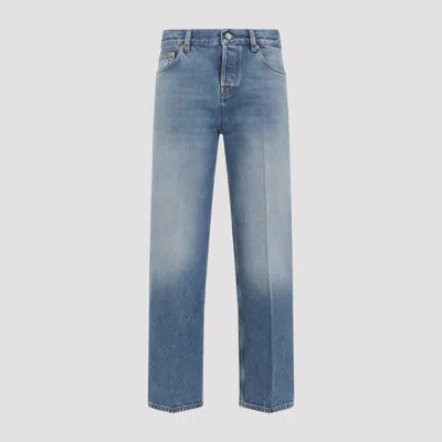 Gucci Blue Jeans With Logo Patch On The Rear And Faded Effect In Denim Woman