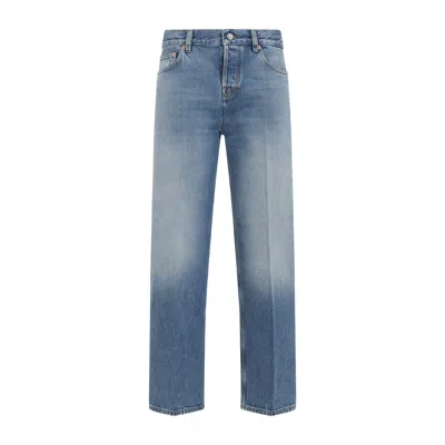 Gucci Blue Jeans With Logo Patch On The Rear And Faded Effect In Denim Woman