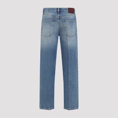 Gucci Blue Jeans With Logo Patch On The Rear And Faded Effect In Denim Woman