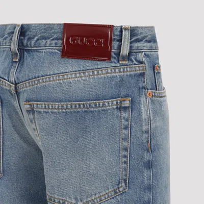 Gucci Blue Jeans With Logo Patch On The Rear And Faded Effect In Denim Woman