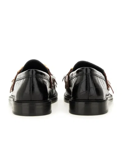 Moschino Textured Round Toe Loafers Fringe In Black