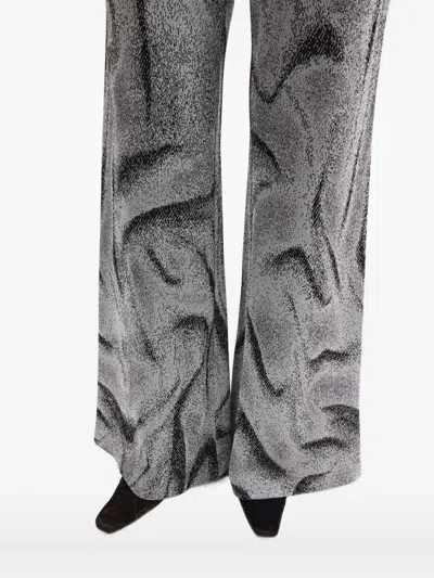 Maccapani Easy Swirl-print Flared Trousers In Black