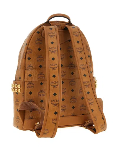 Mcm Small Medium Backpack With Front Pocket And Straps In Brown
