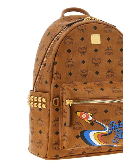 Mcm Small Medium Backpack With Front Pocket And Straps In Brown