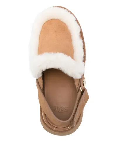 Ugg Suede Mules With Plush Trim And Adjustable Strap In Brown