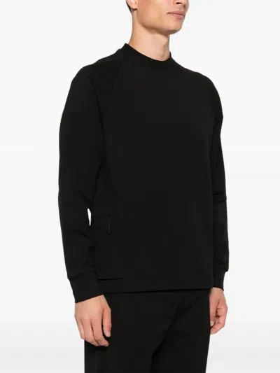 C.p. Company Minimalist Black Long-sleeve Crewneck Sweatshirt With Zippered Pocket In Black