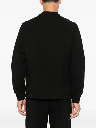 C.p. Company Minimalist Black Long-sleeve Crewneck Sweatshirt With Zippered Pocket In Black