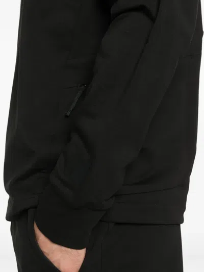 C.p. Company Minimalist Black Long-sleeve Crewneck Sweatshirt With Zippered Pocket In Black