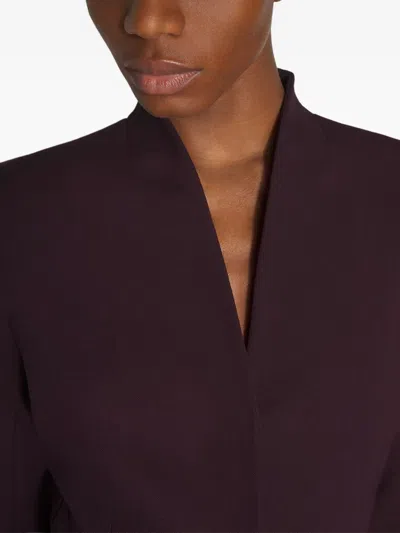 束腰伞摆腰身贴身夹克