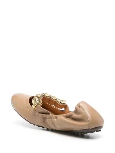Tod's Metallic Rings Strap Nappa Leather Ballerinas In Silver