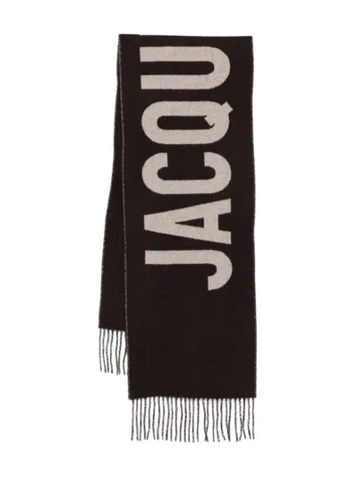 Jacquemus Rectangular Scarf With Fringed Edges And Bold Lettering In Brown