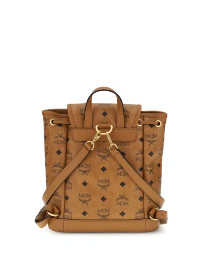 Mcm Monogram Buckle Backpack In Brown
