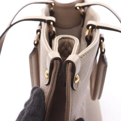 Pre-owned Louis Vuitton Beige Tourterelle Monogram Empreinte Tote Bag ()
